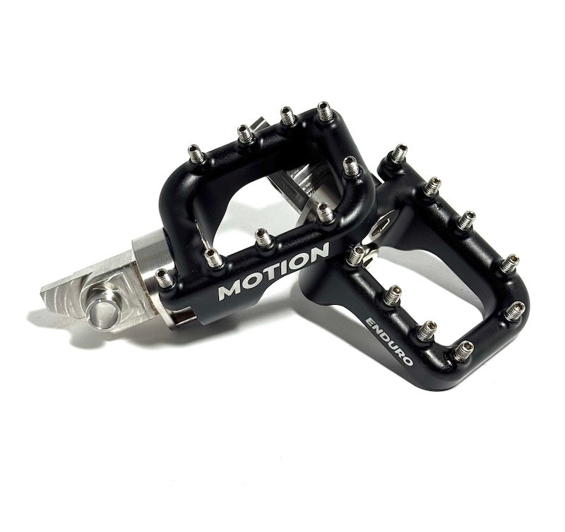 Load video: The industry&#39;s first shock-adsorbing footpeg that acts just like your ankle joint. Reducing fatigue and increasing riding time. These are a game changer when you are standing on your bike. We are excited to release our new Billet Aluminum platforms on the industry&#39;s first &quot;SHOCK ADSORBING&quot; footpeg system. If you spend over $150 on the site, enter code: freeshipping at checkout and the shipping is on us (limited to the United States).  Do you get leg fatigue, cramping, soreness, and discomfort while standing on your footpegs? Are you constantly having to reposition your boot? Do you often feel like you are slipping off your footpegs because of poor grip? Do you struggle to get forward on your bike during hill climbs? Do you often just get tossed around and feel out of control in the whoops? Well, we have a solution for you.